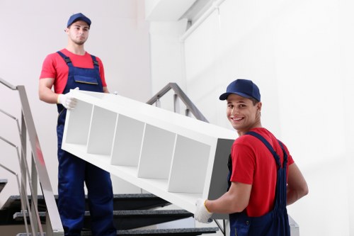 Careful packing of fragile household items for removals
