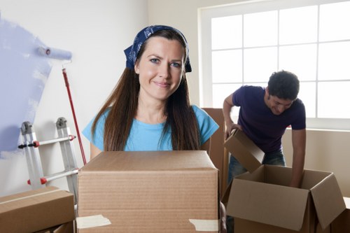Organized storage space with boxes and furniture